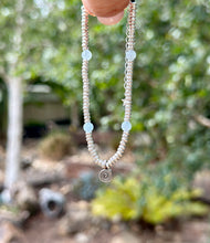Load image into Gallery viewer, Karen Hill Tribe with Aquamarine.
