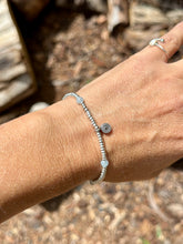 Load image into Gallery viewer, Karen Hill Tribe with Aquamarine.