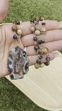 Load and play video in Gallery viewer, Agate Geode Slice Wire Necklace
