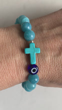 Load and play video in Gallery viewer, Aquamarine Bracelet with Cross Charm &amp; Evil Eye
