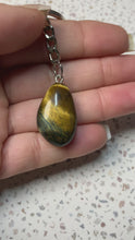 Load and play video in Gallery viewer, Blue Tigers Eye Key Charm
