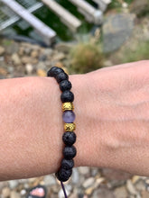 Load image into Gallery viewer, Lavastone With purple cats eye .