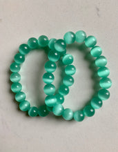 Load image into Gallery viewer, Light Green Cats Eye .