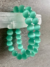 Load image into Gallery viewer, Light Green Cats Eye .