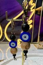 Load image into Gallery viewer, Blue Evil Eye With Wooden Moon  Key Charm.
