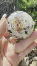 Load and play video in Gallery viewer, Rainbow Moonstone Orgonite Sphere
