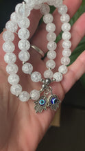 Load and play video in Gallery viewer, Crackle Quartz with Hamsa Hand Bracelet .
