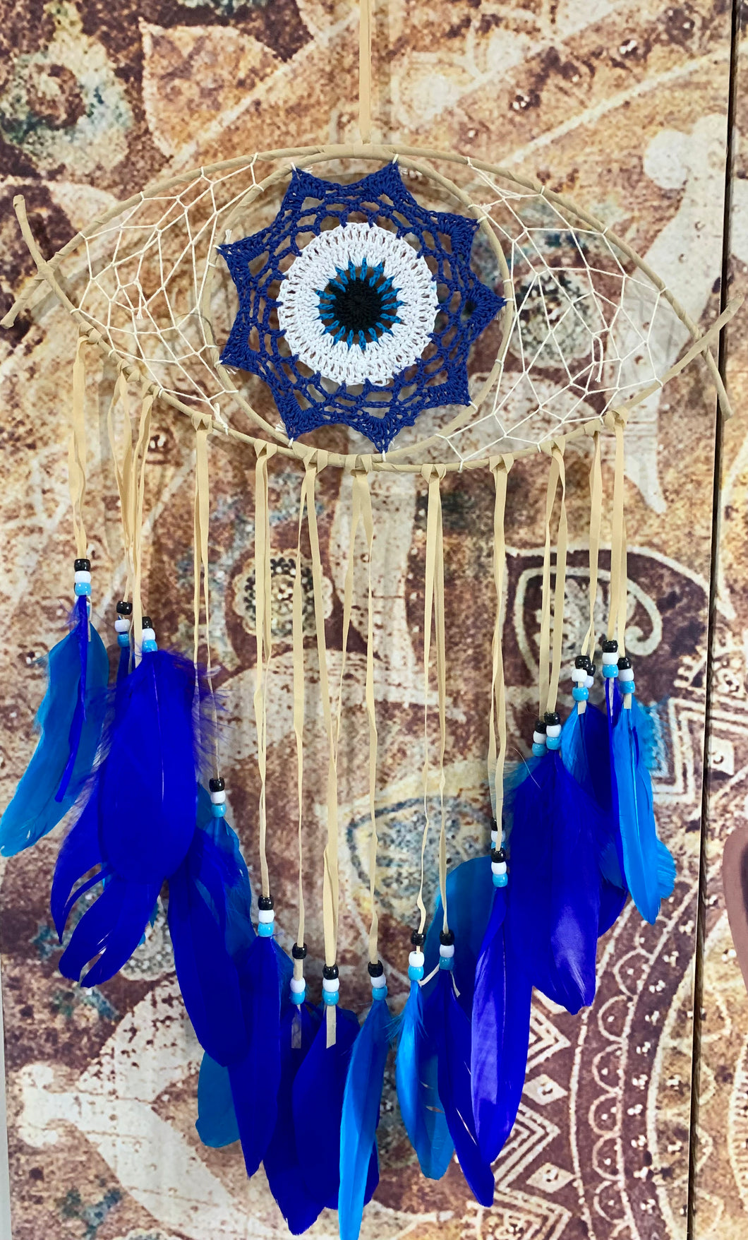 Light Brown Evil Eye Dreamcatcher with Light Blue Feathers