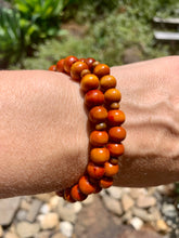 Load image into Gallery viewer, Wooden Orange  Rondelle Bead Bracelet.
