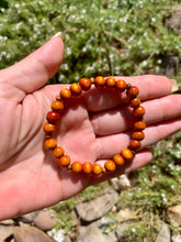 Load image into Gallery viewer, Wooden Orange  Rondelle Bead Bracelet.
